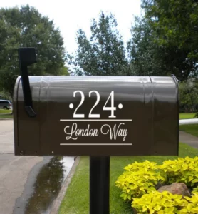 Black mailbox with white lettering