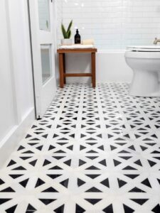 Black and white patterned porcelain tile in bathroom